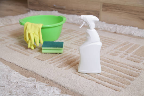 istock Mock-up Plastic Spray Bottle for Chemical and Cleaning Solutions. Cleaning Stain on Carpet. Cleaning Removing Old Stains from Carpet. 2188221894