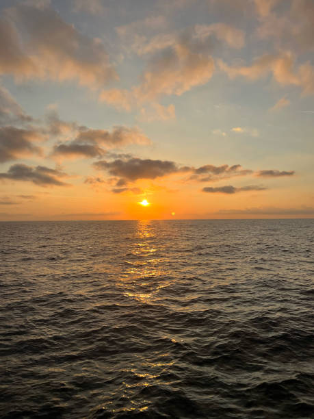 istock sunset over the sea 2188222878