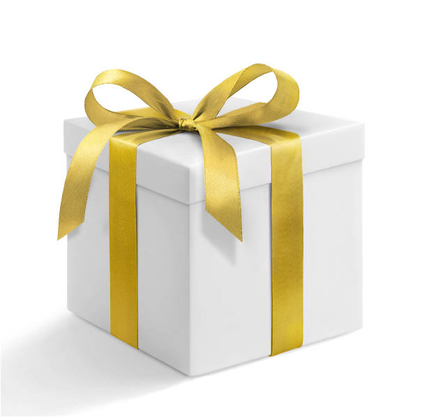 istock An Elegant White Gift Box that is beautifully adorned with a bright Golden Ribbon for Celebrations 2188231613