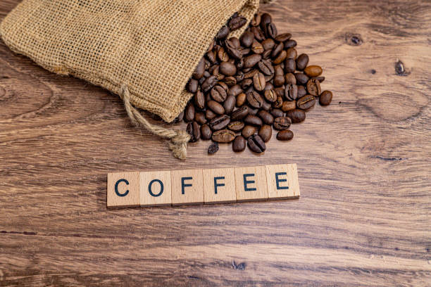 Coffee beans spelled on a board: March