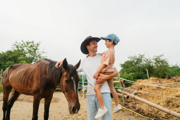 istock Daddy and me at the horse ranch 2188235654
