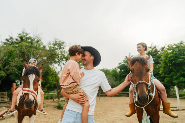 istock Family enjoying horseback riding 2188235731