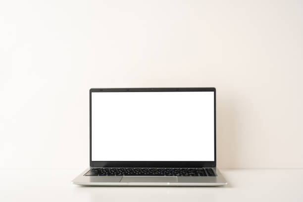A side view simple and elegant laptop on a minimalist desk, reflecting a Scandinavian design style. Perfect for modern workplaces and creative spaces, highlighting simplicity and functionality