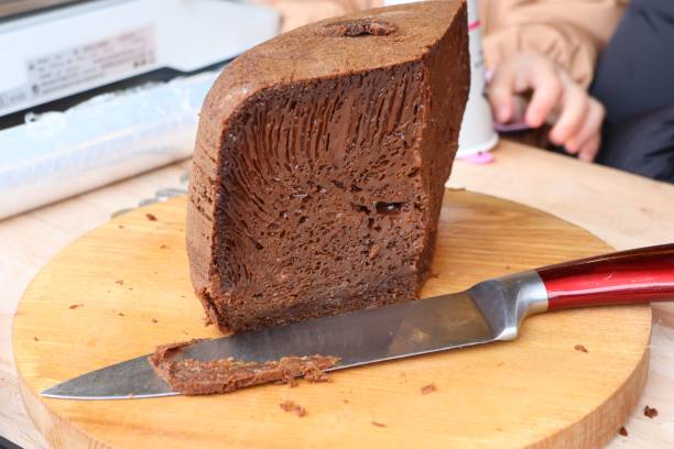 istock Delicious Chocolate Bread Sliced Beautifully on a Rustic Wooden Board for Serving 2188236344