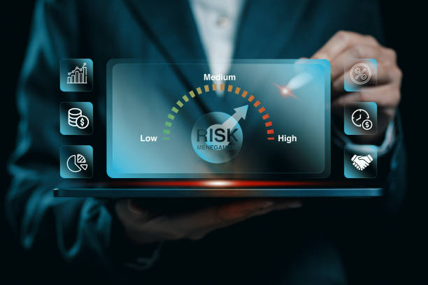 istock Businessman Analyzing Digital Risk Management Dashboard with Low to High Risk Indicator 2188236967