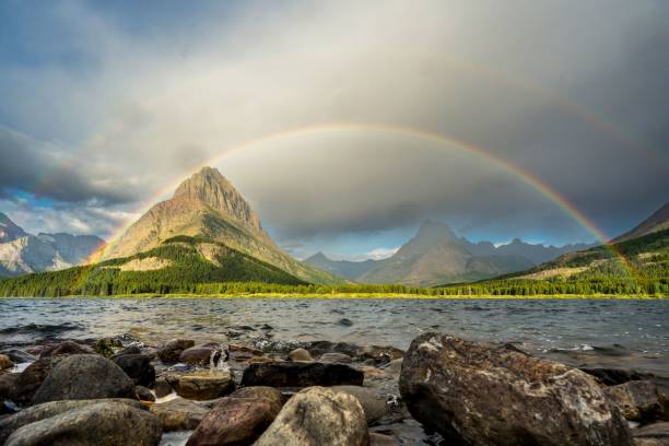 istock Rainbow Over Mountain and Lake in Glacier National Park 2188238646
