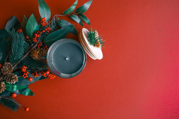 istock A festive glass candle labeled 