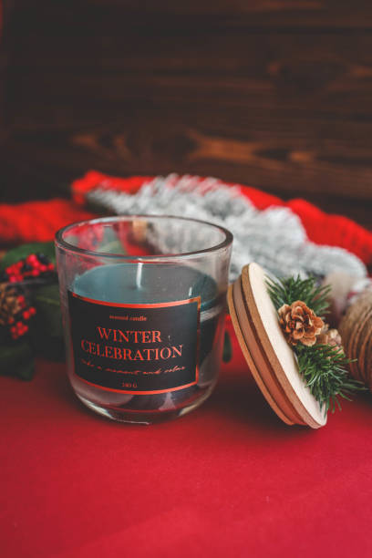 istock A festive glass candle labeled 