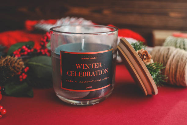 istock A festive glass candle labeled 