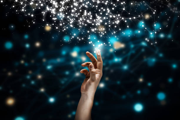 istock Hand Reaching Toward Digital Network of Connected Nodes and Light Points 2188240962