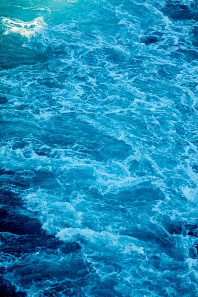 istock Powerful churning waves in deep blue sea 2188241959