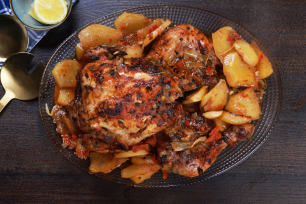 Delicious chicken skewers and baked potatoes with mushrooms.