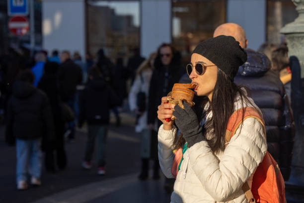 istock The woman eating chimney cake 2188249094