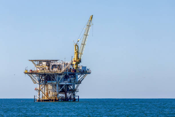 istock Old abandoned sea rusty drilling platform in the ocean, California 2188253731