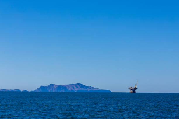 Old abandoned sea rusty drilling platform in the ocean near Channel Islands, California