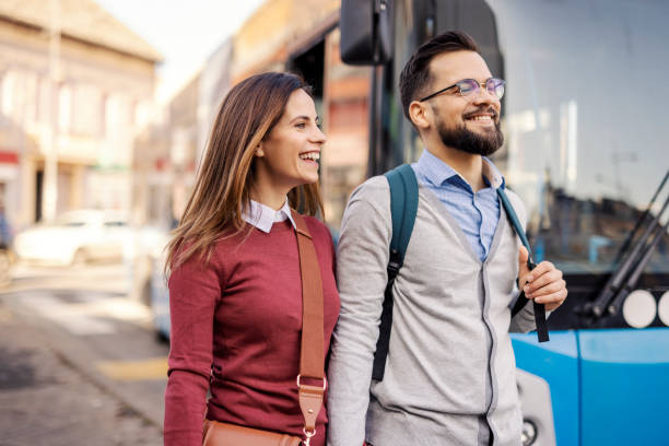 istock Passenger couple walking on bus stop and holding hands. 2188256661