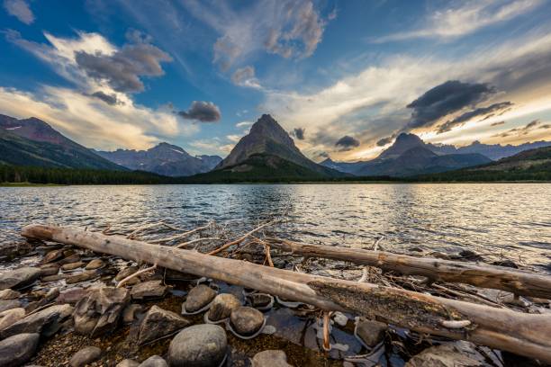 istock Serene Lake with Majestic Mountains at Sunset 2188257753