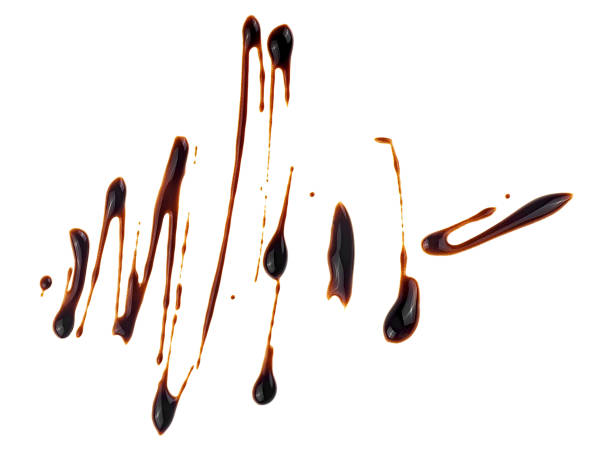 istock Fluid chocolate sauce isolated on a white background. Melted chocolate. 2188259204