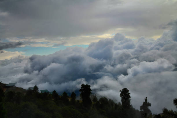 The early morning sunrise over the Perez Zeledon valley is very dramatic.  The formation contains several levels of clouds and colors.    The night lights of the city of Perez Zeledon are not visible in the photo.