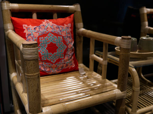 istock bamboo chair with decorative red cushion 2188269418