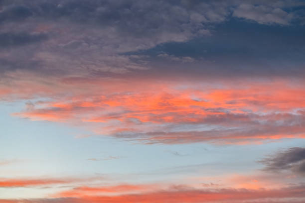 istock Sunset with beautiful rain clouds drifting across the sky 2188276523