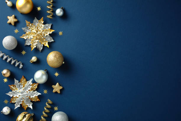 istock Golden and silver Christmas decorations on a blue background. Xmas greeting card template. Flat lay, top view, copy space. 2188278463
