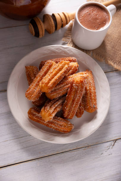 istock Churros and hot chocolate sugary snack 2188280192