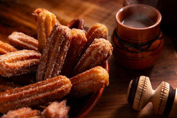 istock homemade Churros and mexican hot chocolate 2188280377