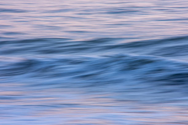 istock A long exposure Photograph of a wave in motion creating a blurred abstract image. 2188281358