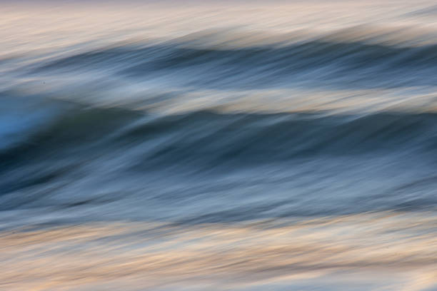 istock A long exposure Photograph of a wave in motion creating a blurred abstract image. 2188281374