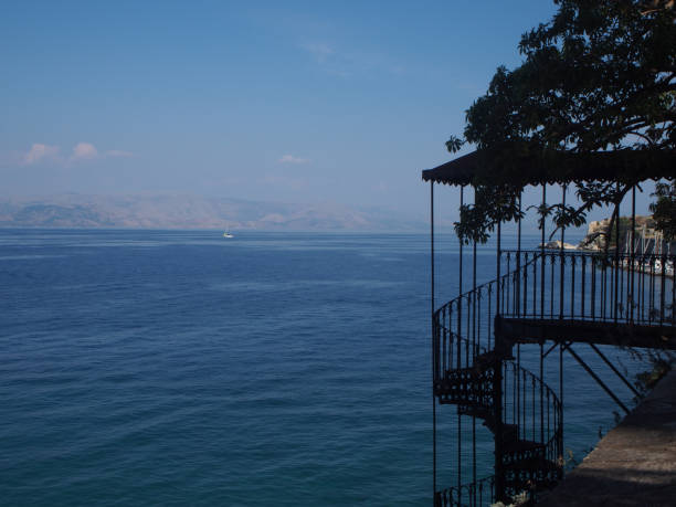 stairs leading down to the water in Corfu, Greece