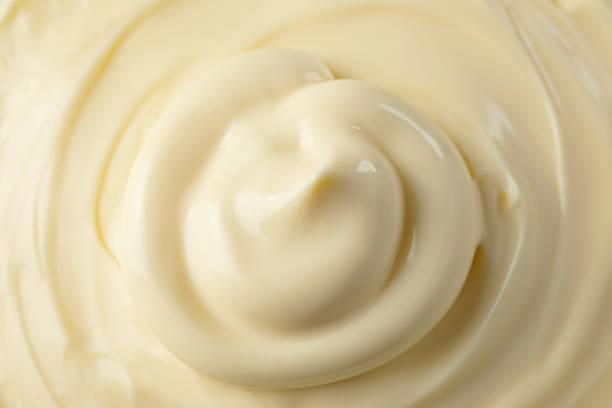 istock Fresh mayonnaise sauce as background, closeup. Top view 2188287014