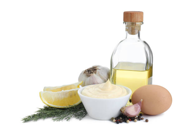 istock Fresh mayonnaise sauce in bowl and ingredients isolated on white 2188287021