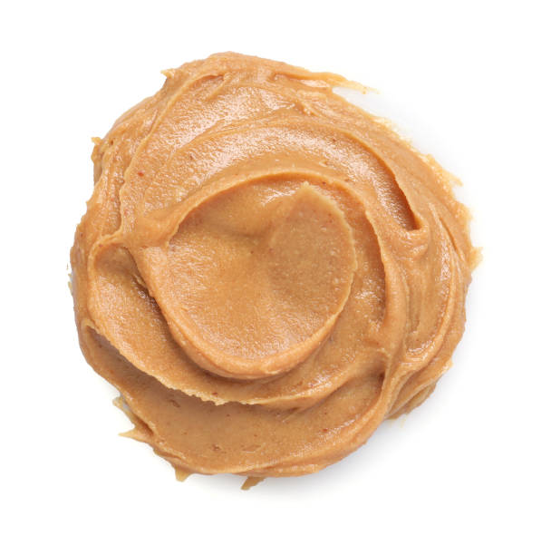 istock Tasty nut butter isolated on white, top view 2188287096