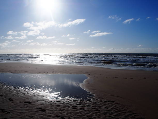 istock Footprints on the sand on the beach in Noordwijk, Netherlands 2188287151
