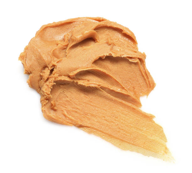 istock Sample of tasty nut butter isolated on white, top view 2188287192
