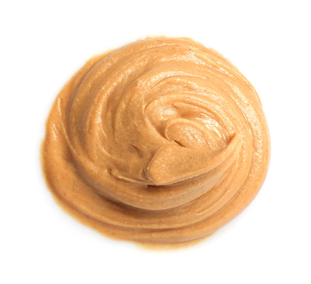 istock Sample of tasty nut butter isolated on white, top view 2188287203