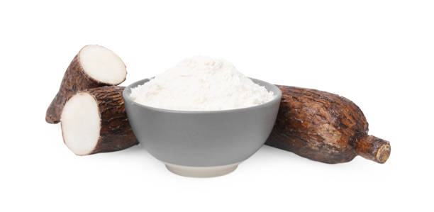 istock Bowl with cassava flour and roots isolated on white 2188287580