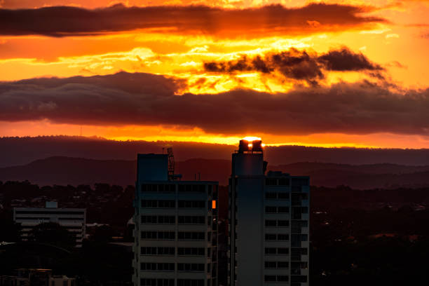 Dramatic sunset in Gold Coast, Queensland, Australia, with urban skyline in the foreground