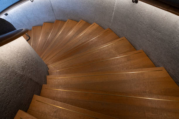 istock Wooden and concrete spiral staircase 2188287678