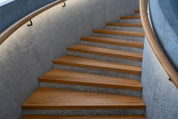 Grand Foyer Down Beautiful Winding Hardwood Staircase in Showcase Home