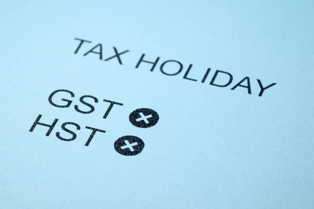 GST and HST followed by an X, symbolizing a tax break.
