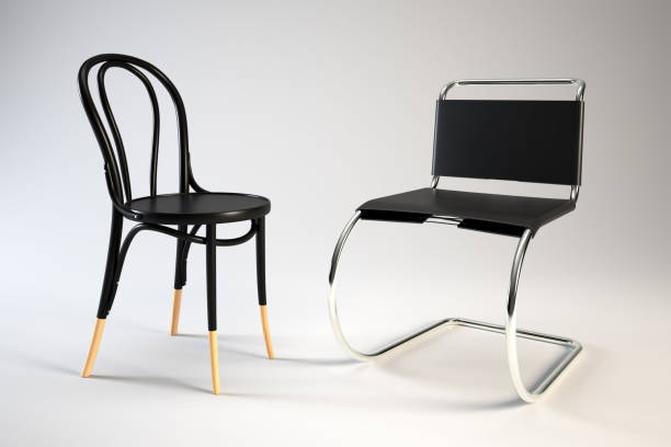istock Two modern chairs have different colored seats and leg styles. 2188294136