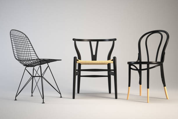 istock Three black chairs different styles stand together on white background. 2188294170