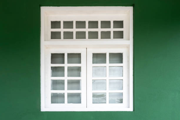 White windows with Western style pastoral style on the green wall