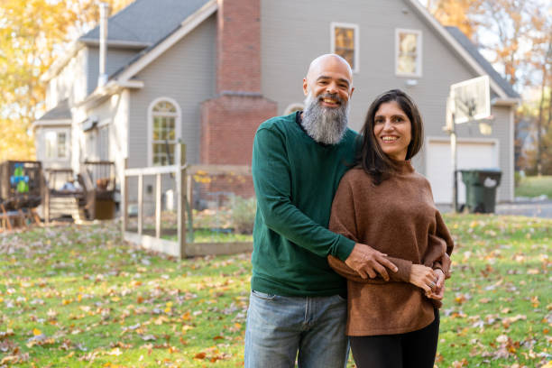 istock Multiracial couple in front of their house 2188296056