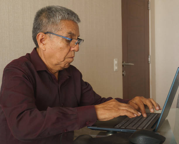 istock Latin American senior working on his laptop. 2188296945
