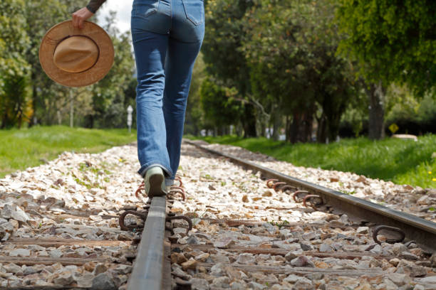 istock Woman on the train track 2188298009
