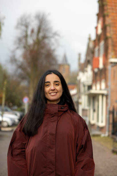 istock woman posing at Edam Town 2188298654