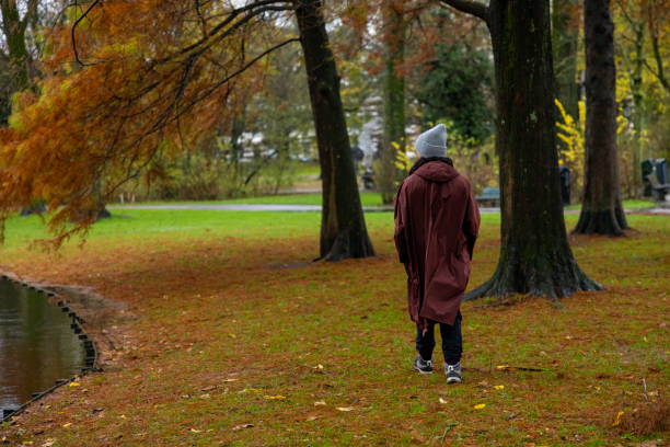 A woman walking alone in the forest